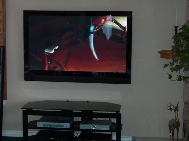 Wall-Mounted TV & Media Stand by Dr. Gadget, Los Angeles CA